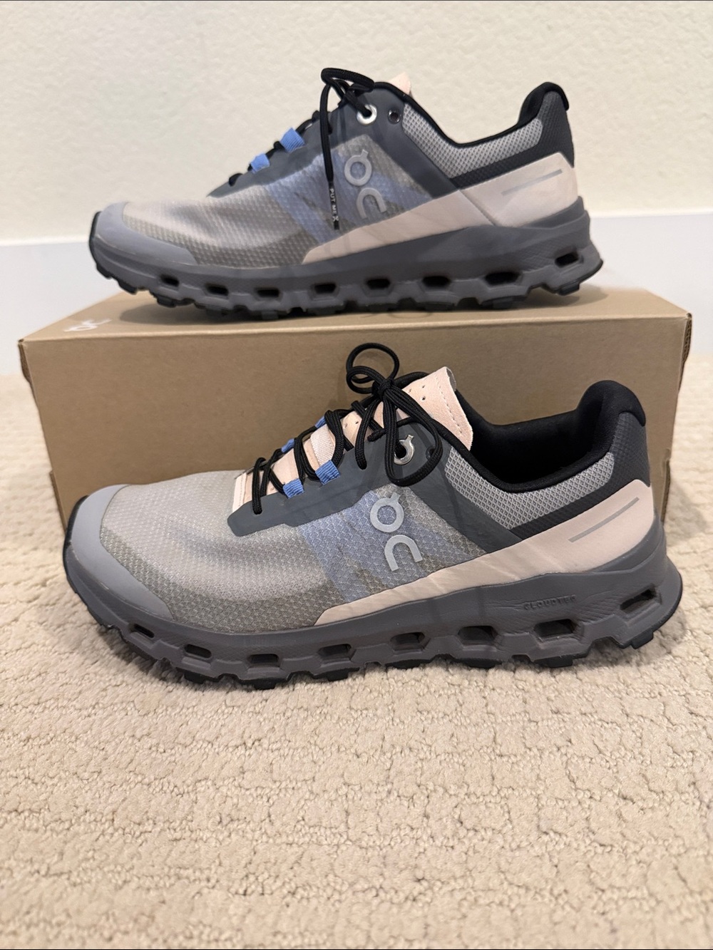 On Running Women's Cloudventure Trail Shoes in Gray and Peach